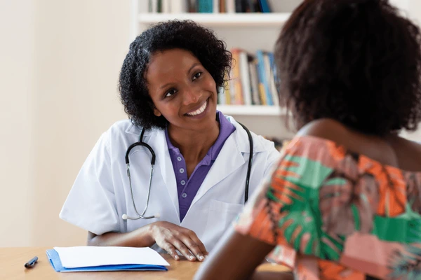 Doctor consulting with patient